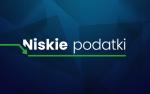Napis Niskie podatki na granatowym tle.