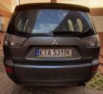 Samochód osobowy Mitsubishi Outlander,  2007r., widoczne otarcia