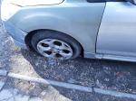 Samochód osobowy Ford Focus w kolorze srebrnym, pojazd uszkodzony 